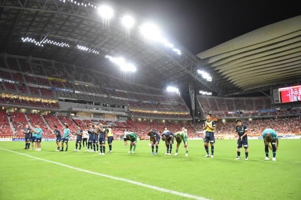 Avispa Fukuoka players applaud fans after the J.League Meiji Yasuda J1 match between Nagoya Grampus and Avispa Fukuoka at the Toyota Stadium on...