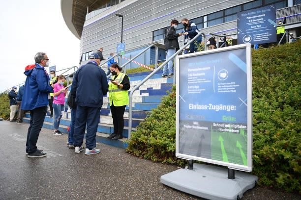 Covid-19 guidelines are displayed outside the stadium prior to the Bundesliga match between TSG Hoffenheim and 1. FC Union Berlin at PreZero-Arena on...