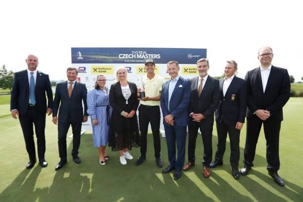 Johannes Veerman of United States poses with the trophy after winning the D+D Real Czech Masters alongside sponsors and suppliers during Day Four of...
