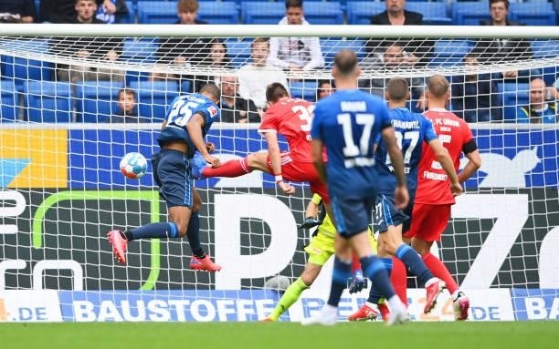 Kevin Akpoguma of TSG 1899 Hoffenheim scores their side's first goal during the Bundesliga match between TSG Hoffenheim and 1. FC Union Berlin at...