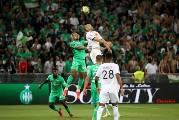 Burak Yilmaz of Lille, Ivann Macon of Saint-Etienne during the Ligue 1 match between AS Saint Etienne and Lille OSC at Stade Geoffroy-Guichard on...