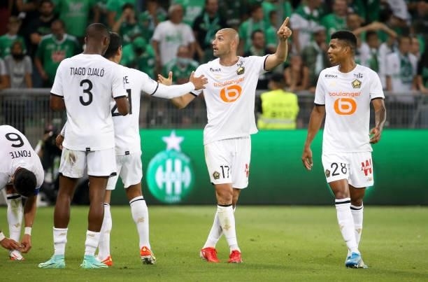 Burak Yilmaz of Lille celebrates his goal during the Ligue 1 match between AS Saint Etienne and Lille OSC at Stade Geoffroy-Guichard on August 21,...