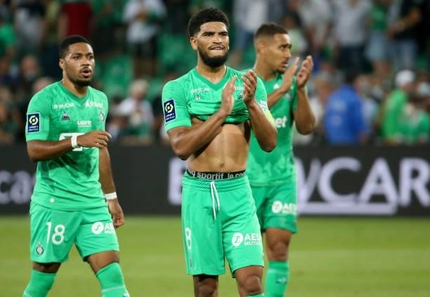 Mahdi Camara, Ivann Macon of Saint-Etienne salute the supporters following the Ligue 1 match between AS Saint Etienne and Lille OSC at Stade...
