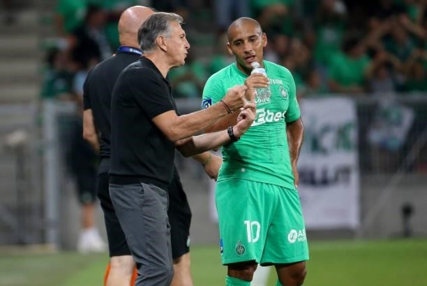 Coach of AS Saint-Etienne Claude Puel talks to Wahbi Khazri of Saint-Etienne during the Ligue 1 match between AS Saint Etienne and Lille OSC at Stade...
