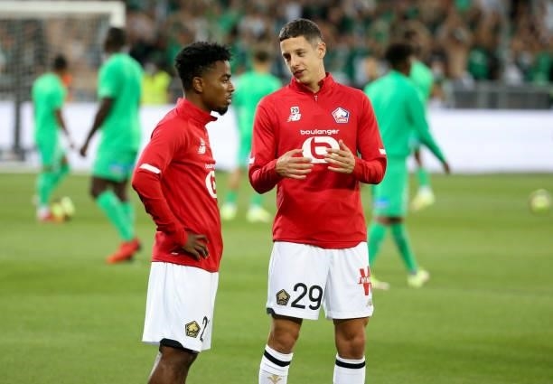 Angel Gomes, Domagoj Bradaric of Lille during the warm up before the Ligue 1 match between AS Saint Etienne and Lille OSC at Stade Geoffroy-Guichard...