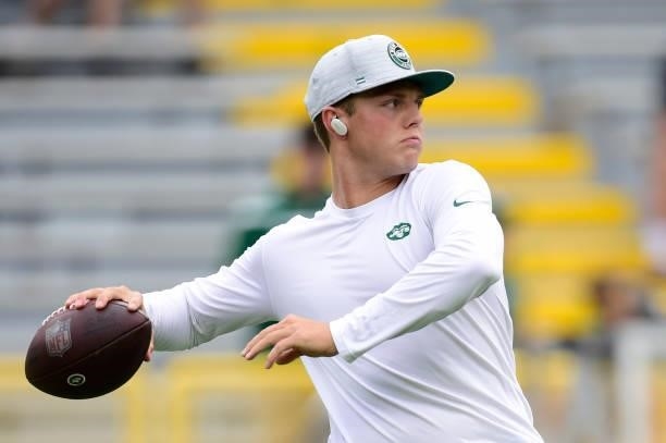 Zach Wilson of the New York Jets throws a pass during warmups before a preseason game against the Green Bay Packers at Lambeau Field on August 21,...