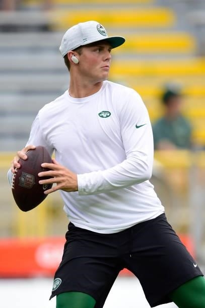 Zach Wilson of the New York Jets throws a pass during warmups before a preseason game against the Green Bay Packers at Lambeau Field on August 21,...