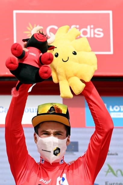 Primoz Roglic of Slovenia and Team Jumbo - Visma celebrates winning the red leader jersey on the podium ceremony after the 76th Tour of Spain 2021,...