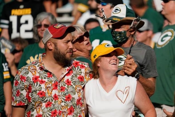 Green Bay Packers fans cheer during a preseason game against the New York Jets at Lambeau Field on August 21, 2021 in Green Bay, Wisconsin.