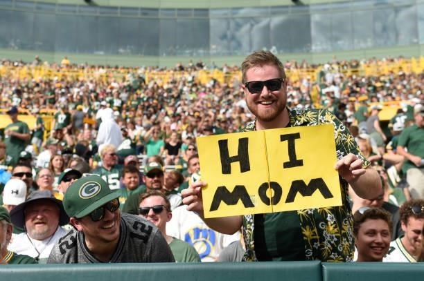 Green Bay Packers fan holds up a sign during a preseason game against the New York Jets at Lambeau Field on August 21, 2021 in Green Bay, Wisconsin.