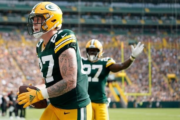 Jace Sternberger of the Green Bay Packers celebrates after catching a touchdown pass against the New York Jets in the first half of a preseason game...