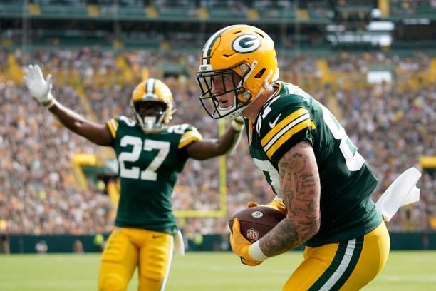 Jace Sternberger of the Green Bay Packers celebrates after catching a touchdown pass against the New York Jets in the first half of a preseason game...