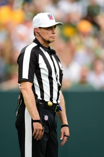 Referee Tony Corrente looks on in the first half of a preseason game between the New York Jets and Green Bay Packers at Lambeau Field on August 21,...