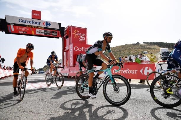 Juan Jose Lobato Del Valle of Spain and Team Euskaltel - Euskadi and Luka Mezgec of Slovenia and Team BikeExchange cross the finishing line during...