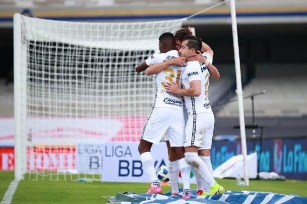 Juan Dinenno of Pumas UNAM celebrate with teammates after scoring the second goal of his team during the 6th round match between Pumas UNAM and...