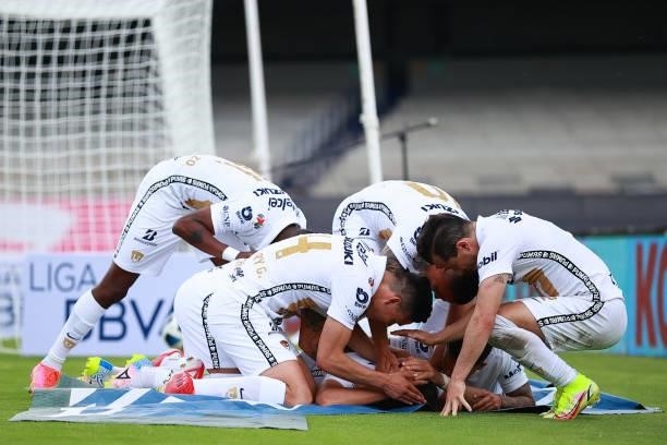 Juan Dinenno of Pumas UNAM celebrate with teammates after scoring the second goal of his team during the 6th round match between Pumas UNAM and...