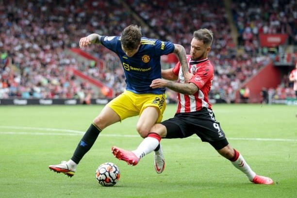 Adam Armstrong of Southampton challenges Victor Lindelof of Manchester United during the Premier League match between Southampton and Manchester...