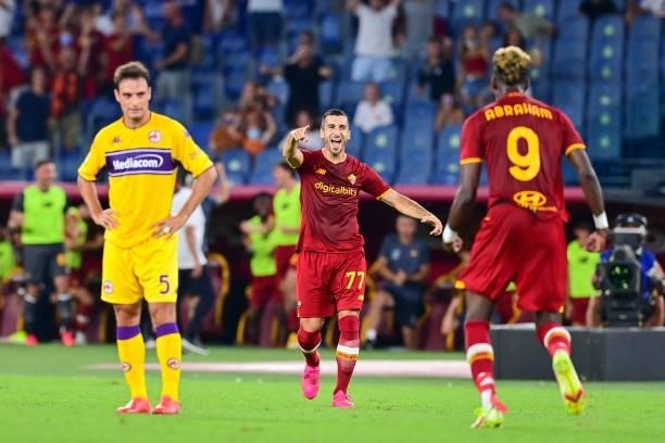 Henrikh Mkhitaryan celebrates his goal during the Serie A match between AS Roma and ACF Fiorentina at Stadio Olimpico on August 22, 2021 in Rome,...