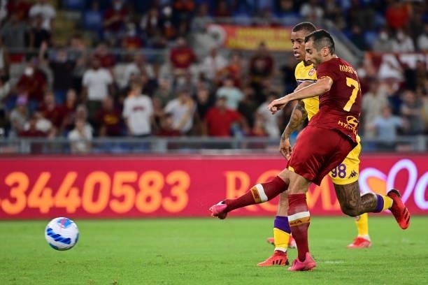 Roma player Henrikh Mkitaryan scores the goal during the Serie A match between AS Roma and ACF Fiorentina at Stadio Olimpico on August 22, 2021 in...