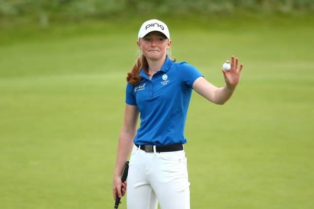 Louise Duncan of Scotland acknowledges the crowd after putting in on the eighteenth green during Day Four of the AIG Women's Open at Carnoustie Golf...