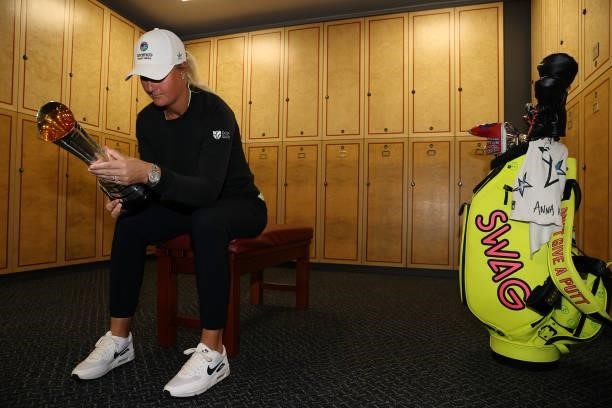 Champion, Anna Nordqvist of Sweden poses with the AIG Women's Open trophy in the locker room following Day Four of the AIG Women's Open at Carnoustie...