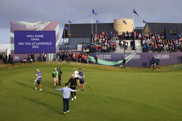 Champion, Anna Nordqvist of Sweden is congratulated by husband, Kevin McAlpine during Day Four of the AIG Women's Open at Carnoustie Golf Links on...