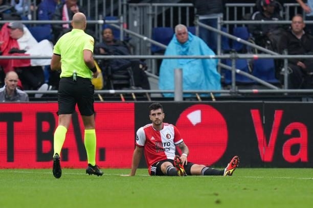Marcos Senesi of Feyenoord injured on the ground during the Dutch Eredivisie match between Feyenoord and Go Ahead Eagles at Stadion Feijenoord De...
