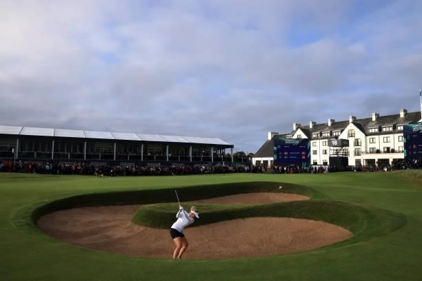 Nanna Koerstz Madsen of Denmark plays a bunker shot on the eighteenth hole during Day Four of the AIG Women's Open at Carnoustie Golf Links on August...
