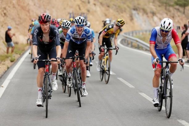Pavel Sivakov of Russia and Team INEOS Grenadiers polka dot mountain jersey and Jacopo Guarnieri of Italy and Team Groupama - FDJ compete during the...