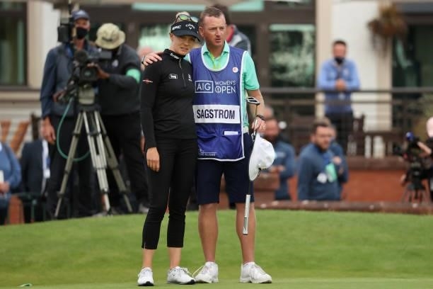 Madelene Sagstrom of Sweden reacts with her caddie after making a bogey on the eighteenth green during Day Four of the AIG Women's Open at Carnoustie...