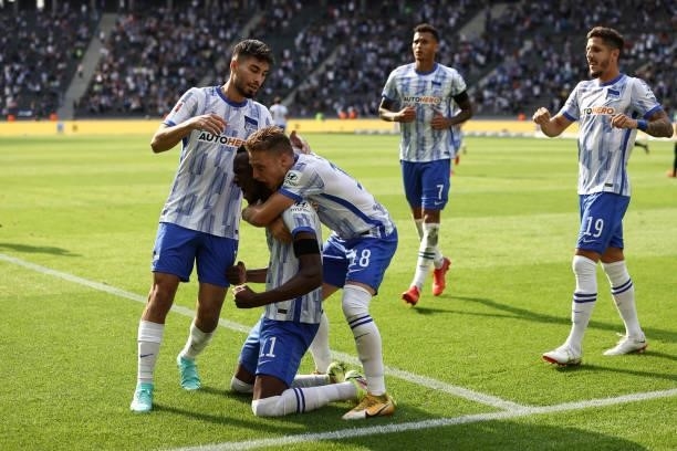 Dodi Lukebakio of Hertha Berlin celebrates after scoring their side's first goal during the Bundesliga match between Hertha BSC and VfL Wolfsburg at...
