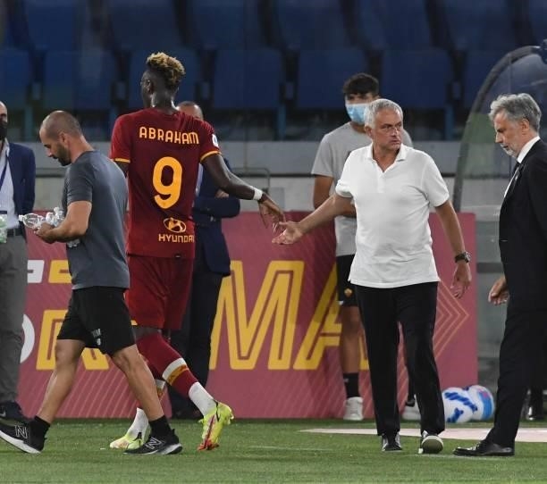 Tammy Abraham greets Josè Mourinho head coach of AS Roma during the Serie A match between AS Roma v ACF Fiorentina at Stadio Olimpico on August 22,...