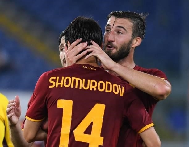 Bryan Cristante of AS Roma greets Eldor Shomurodov at the end of the Serie A match between AS Roma v ACF Fiorentina at Stadio Olimpico on August 22,...