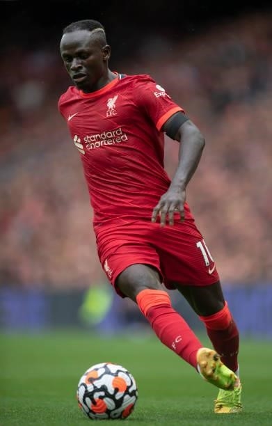 Sadio Mané of Liverpool in action during the Premier League match between Liverpool and Burnley at Anfield on August 21, 2021 in Liverpool, England.
