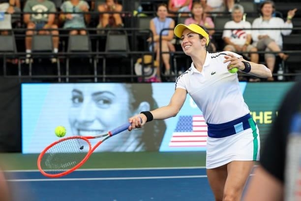Christina McHale of USA volleys signed tennis balls to fans at Jacobs Pavilion on August 22, 2021 in Cleveland, Ohio.