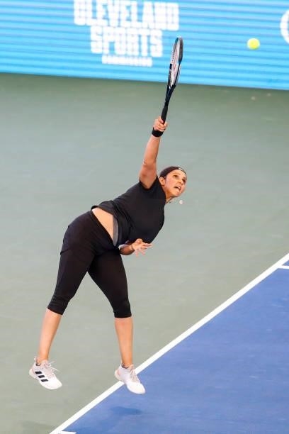 Sania Mirza of India serves the ball during her doubles match against Oksana Kalashnikova of Georgia and Andreea Mitu of Romania at Jacobs Pavilion...