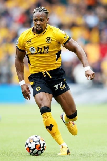 Adama Traore of Wolverhampton Wanderers runs with the ball during the Premier League match between Wolverhampton Wanderers and Tottenham Hotspur at...