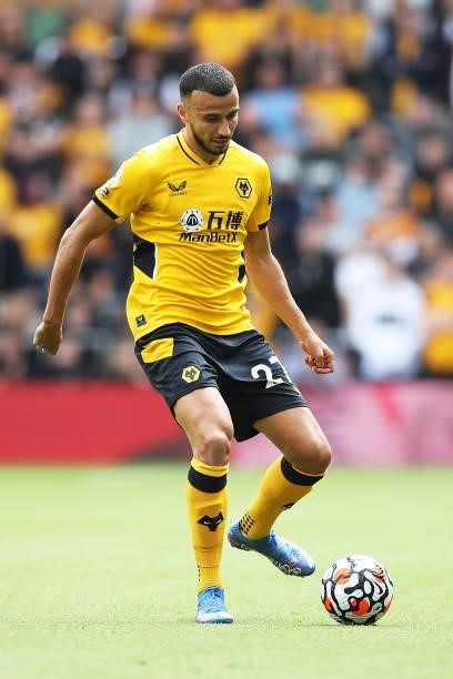 Romain Saiss of Wolverhampton Wanderers runs with the ball during the Premier League match between Wolverhampton Wanderers and Tottenham Hotspur at...
