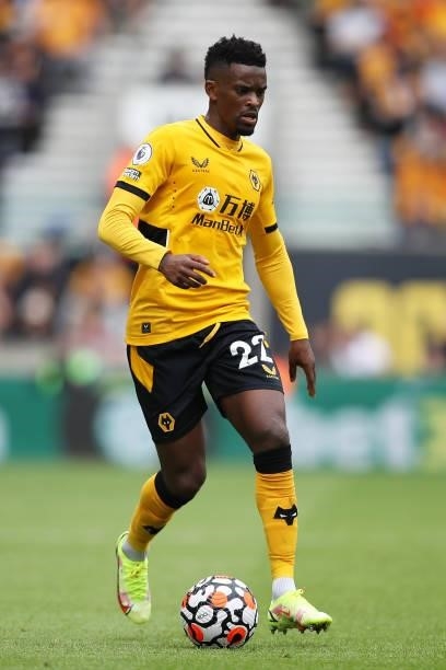 Nelson Semedo of Wolverhampton Wanderers runs with the ball during the Premier League match between Wolverhampton Wanderers and Tottenham Hotspur at...