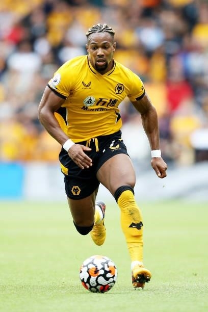 Adama Traore of Wolverhampton Wanderers runs with the ball during the Premier League match between Wolverhampton Wanderers and Tottenham Hotspur at...