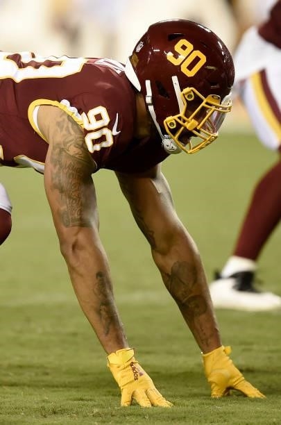 Montez Sweat of the Washington Football Team lines up during the NFL preseason game against the Cincinnati Bengals at FedExField on August 20, 2021...
