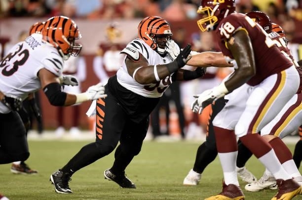 Tyler Shelvin of the Cincinnati Bengals rushes off the line during the NFL preseason game against the Washington Football Team at FedExField on...