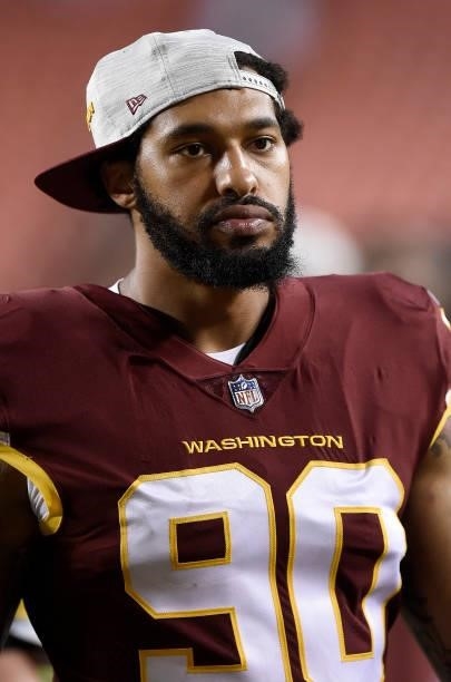 Montez Sweat of the Washington Football Team walks off the field after the NFL preseason game against the Cincinnati Bengals at FedExField on August...