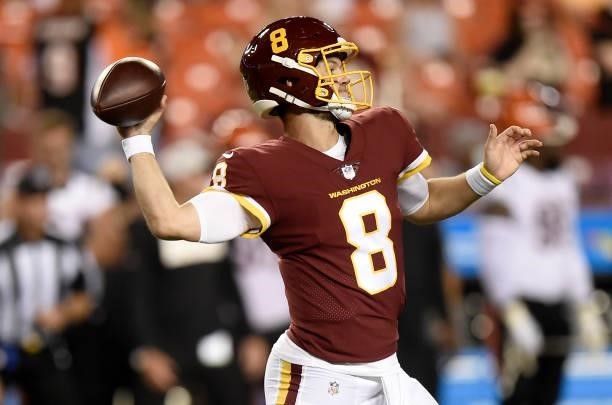 Kyle Allen of the Washington Football Team throws a pass during the NFL preseason game against the Cincinnati Bengals at FedExField on August 20,...
