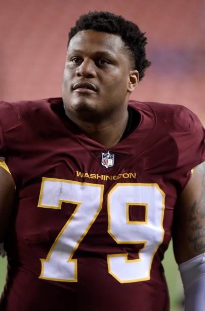 Ereck Flowers of the Washington Football Team walks off the field after the NFL preseason game against the Cincinnati Bengals at FedExField on August...