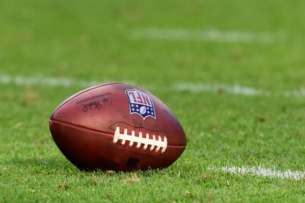An official NFL game football on the field in the second half of a preseason game between the New York Jets and Green Bay Packers at Lambeau Field on...