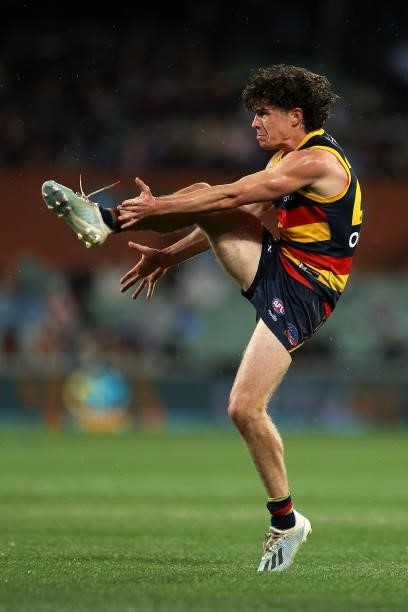 Ned McHenry of the Crows kicks for goal during the round 23 AFL match between Adelaide Crows and North Melbourne Kangaroos at Adelaide Oval on August...