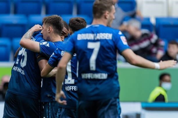 Kevin Akpoguma of Hoffenheim celebrates his team's first goal with his team mates during the Bundesliga match between TSG Hoffenheim and 1. FC Union...