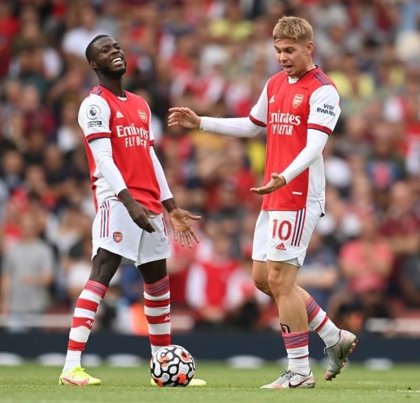 Nicolas Pepe and Emile Smith Rowe look frustrated during the Premier League match between Arsenal and Chelsea at Emirates Stadium on August 22, 2021...
