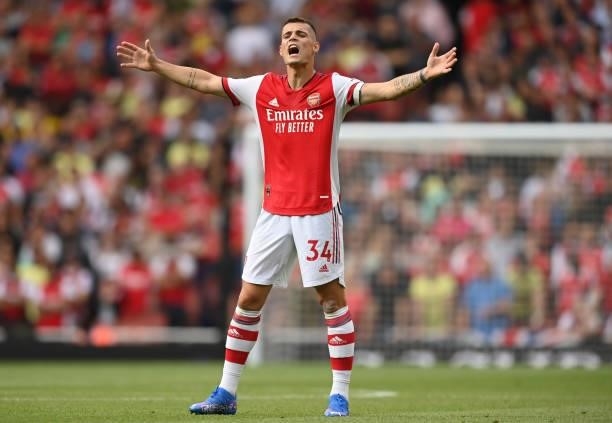 Granit Xhaka of Arsenal in action during the Premier League match between Arsenal and Chelsea at Emirates Stadium on August 22, 2021 in London,...